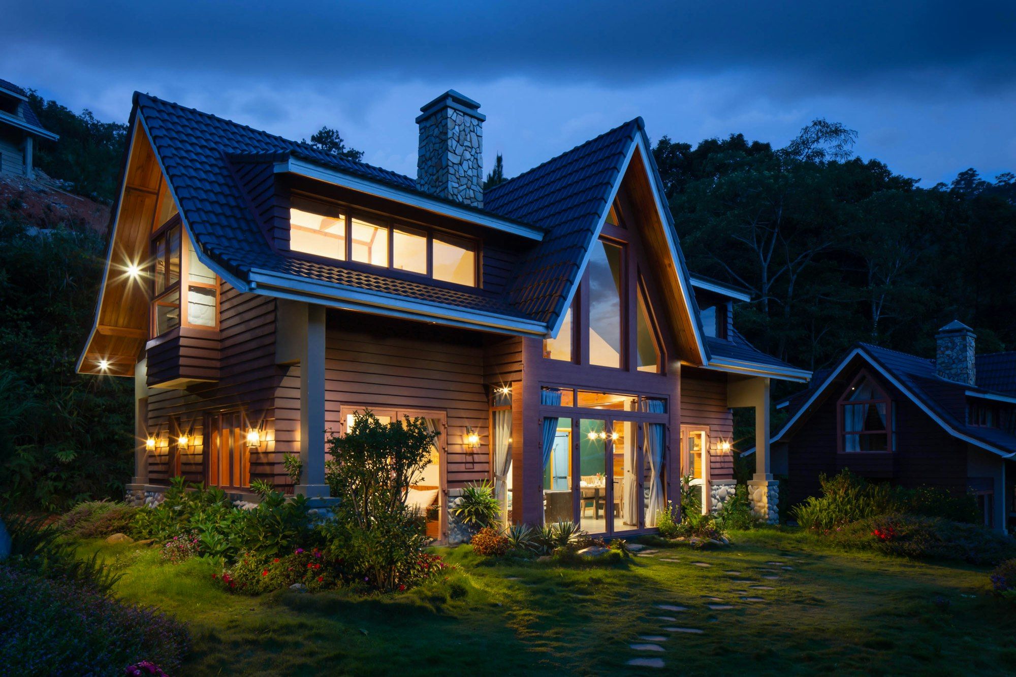 Raleigh home at dusk remodeled by Blue Sky Services